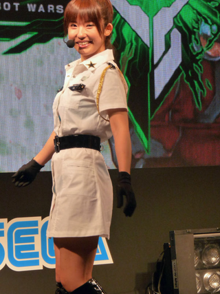 Illustration for article titled 2009's Cosplaying Arcade Game Booth Companions
